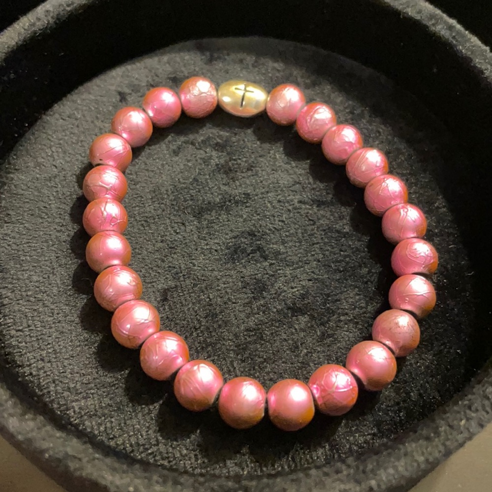 Handmade pink cross bracelet